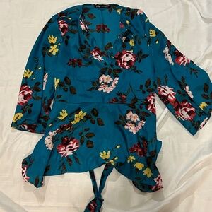 Zara Women’s blue floral print belted satin shirt
